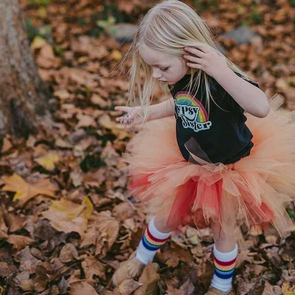Adventure rainbow toddler socks styled with sneakers