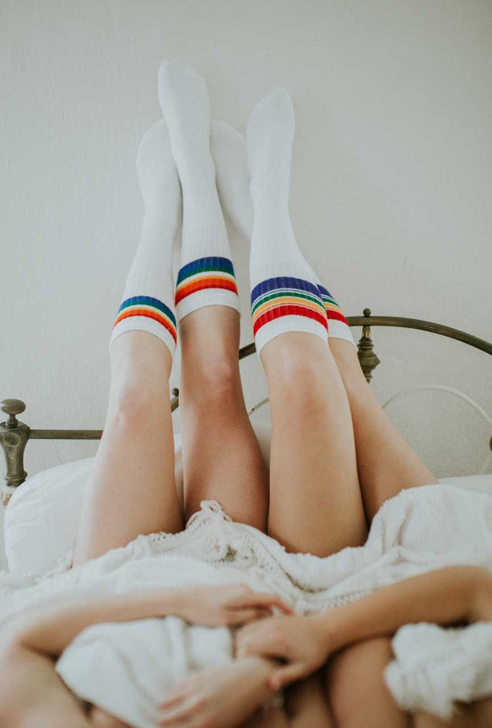 Lifestyle image of Adventure rainbow striped tube socks