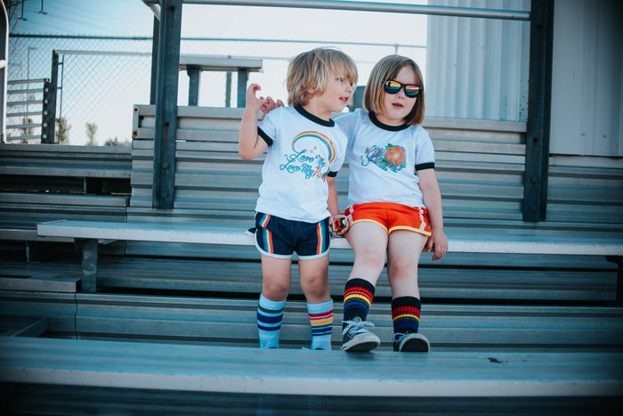 Lifestyle image of rainbow toddler socks 3 pack