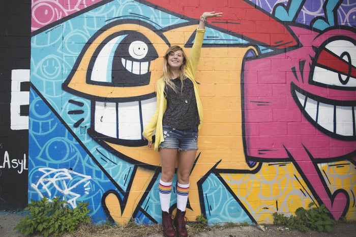 Lifestyle image of Fearless rainbow tube socks with casual outfit